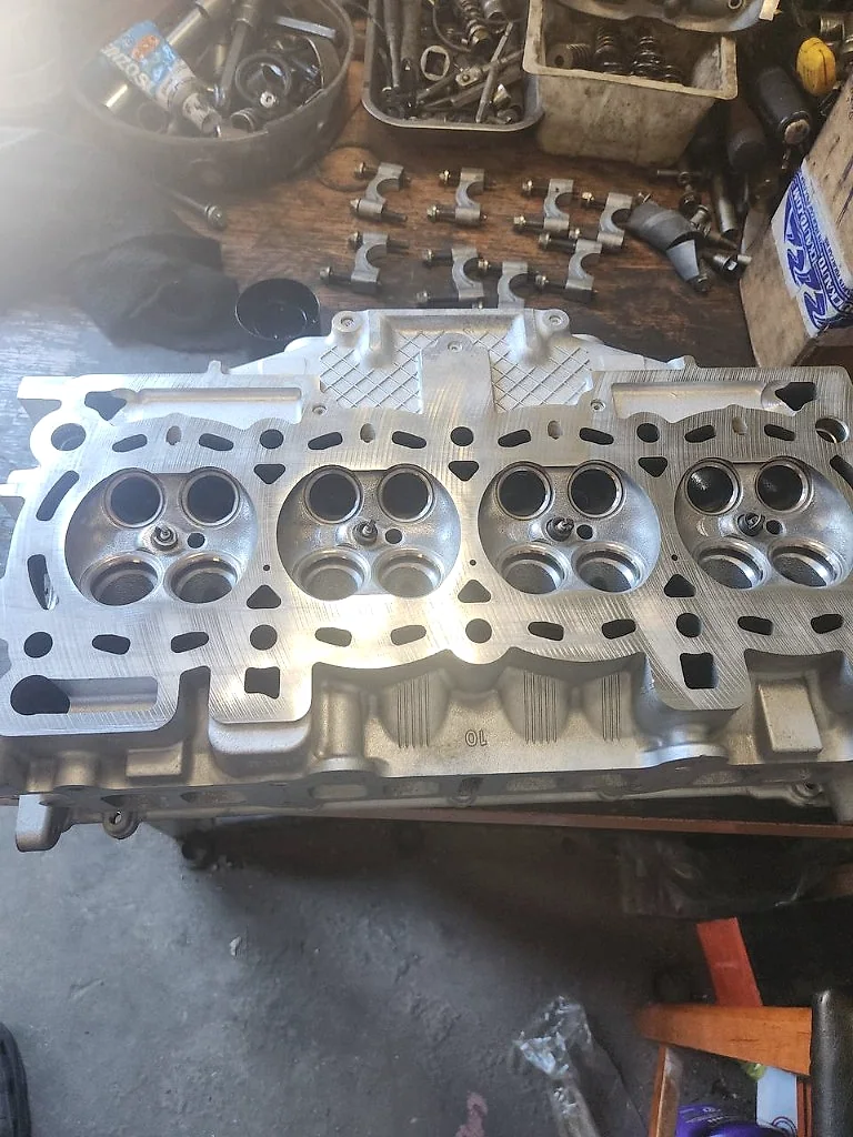 Machined cylinder head with clean valve seats at MotorDoc