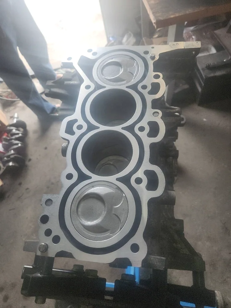Four-cylinder engine block prepared for reassembly at MotorDoc